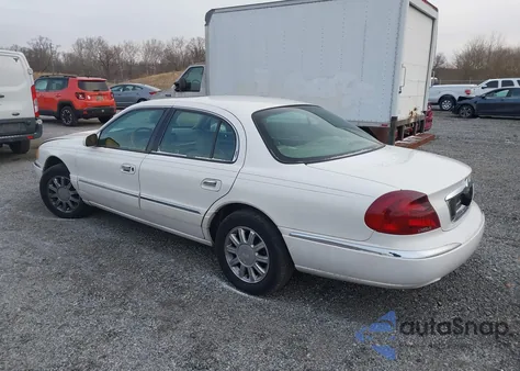 2002 Lincoln Continental z USA, uszkodzony, nr VIN 1LNHM97V52Y678644